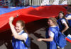 Noua Lege a Educației din Rusia va promova patriotismul: Se cântă imnul, se va arbora drapelul și se introduc simbolurile naționale